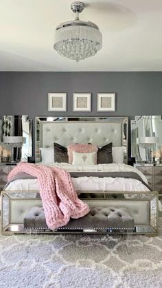 a bedroom with gray walls and white carpet