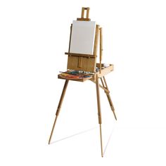 a wooden easel with a white board on it