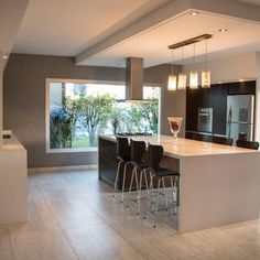 the kitchen is clean and ready to be used for dinner or other entertaining purposes in someone's home