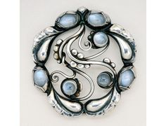 Georg Jensen: moonstone and sterling silver brooch, 1-3/4" x 1-7/8" (CAD $1,200) Georg Jensen Jewelry, Bijoux Art Nouveau, Sterling Silver Brooch, Art Nouveau Jewelry, Georg Jensen, Deco Jewelry, Silver Brooch, Look Vintage, Art Deco Jewelry