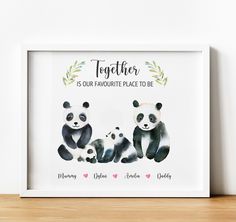 two panda bears sitting next to each other on top of a wooden shelf with the words together is our favorite place to be