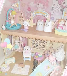 a doll house with lots of toys in it