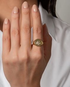 Uber chic large signet ring in your choice of 14K white gold,14K rose gold, and 14K yellow gold with your choice of font, and engraving, either a single initial, 2 initials or monogrammed, this signet will be your new obsession, this ring is a classic and timeless. Please note for monogrammed pieces enter the letters in the following order: FIRST INITIAL(first name), SECOND INITIAL(last name), THIRD INITIAL(middle name). Example: For 'Louisa May Alcott' type 'LAM'. Made in L.A. Size: Approx. 0.5 Engraved Signet Ring, New Obsession, Middle Name, Gold Engraving, First Name, Signet Ring, Birthday Presents, Gold Vermeil, Class Ring