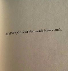 an open book with the words to all the girls with their heads in the clouds