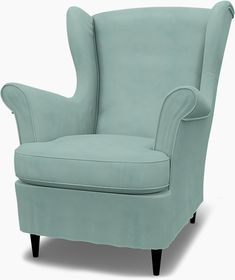 a light blue chair sitting on top of a white floor