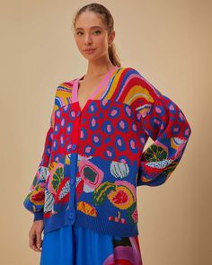 model wearing relaxed fit cardigan with colorful waves, colorful leopard print and colorful abstract fruit print Multicolor Knit V-neck Cardigan, Knit V-neck Sweater Coat With Button Closure, Cozy Multicolor V-neck Cardigan, Knit V-neck Sweater With Buttons For Fall, Knit V-neck Sweater With Button Closure And Long Sleeves, V-neck Soft Knit Sweater Coat For Spring, Trendy Soft Knit V-neck Sweater Coat, Trendy Knit V-neck Cardigan, Trendy Multicolor Sweater With Button Closure