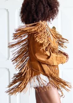 Beautiful vintage piece from the 1970s, suede leather fringed jacket. Magnificent craftsmanship. In excellent condition Size S Measurements taken flat shoulder width: 42 cm (17") width under chest: 46 cm (18") handle length: 58 cm (23") length: 83 cm (33") To benefit from free delivery costs, please give me your Mondial relay address Winter Festival Leather Jacket With Fringe, Fall Festival Leather Jacket With Fringe, Bohemian Winter Leather Jacket With Fringe, Bohemian Long Sleeve Leather Jacket With Fringe, Brown Leather Jacket With Fringe, Fringed Jacket, Suede Leather Jacket, Fringe Leather Jacket, Fringe Jacket