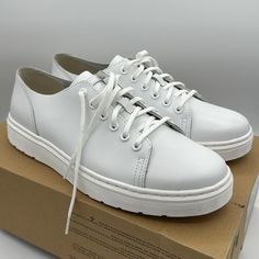 Deliberately Deconstructed And Raw, The Dante 6-Eye Shoe Offers A Crisp, Minimalist Monochrome Look In All White. Lightweight And Seasonally Practical, It's A Fresh Street Shoe Made With Venice, A Premium Full-Grain Leather With A Soft Feel. It Still Bears All The Hallmarks A Classic Doc, Though, Like Stitching, Grooved Sides And Our Iconic Air-Cushioned Sole. Upper: 100% Leather Lining: 100% Textile Sole: 100% Pvc Material: A Super-Smooth, Fine-Grained Hide That Lends A Premium Feel To Our Foot Casual Brown Leather Shoes, Brown Oxford Shoes, Minimalist Monochrome, Leather Shoe Laces, Casual Oxford Shoes, Black Leather Oxfords, Black Leather Sneakers, Brown Leather Shoes, Leather Oxford Shoes