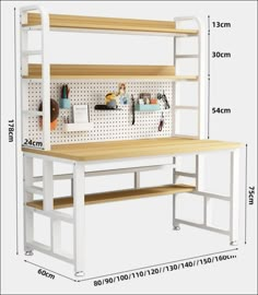 a white workbench with wooden shelves and pegboard on the wall next to it