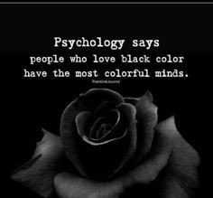 a black and white photo with a rose in the center that says, psychology says people who love black color have the most colorful minds