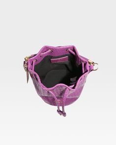 Introducing our exquisite Purple Drawstring Mini Bucket Purse. This luxurious accessory showcases intricate craftsmanship and unique drawstring detailing. Made with only the finest materials, this purse is a must-have for any fashion-forward individual. Elevate your style with this exclusive and elegant piece. Luxury Spring Bucket Bag With Detachable Handle, Luxury Satchel Bucket Bag With Removable Pouch, Luxury Trendy Pink Bucket Bag, Cheap Purple Double Handle Satchel, Cheap Party Bucket Shoulder Bag, Rolling Duffle Bag, Fancy Purses, Nylon Travel Bag, Bucket Purse