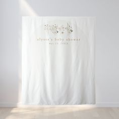 a white shower curtain with the words, always baby shower written in gold on it