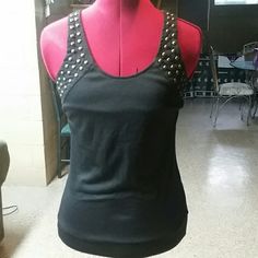 This Beautiful Black Studded Shirt Is Great Paired With Any Bottom. It's Full Of Detail. You Can Lace It Up In The Back Make It Loose Or Tight. Bronze/Gold Studs Makes It Very Edgy! Edgy Cotton Party Top, Punk Stretch Tops For Night Out, Punk Style Stretch Tops For Night Out, Edgy Cotton Top For Night Out, Punk Style Cotton Party Tops, Edgy Cotton Tank Top For Night Out, Black Fitted Rebellious Tops, Black And Gold Shirt, Studded Shirt