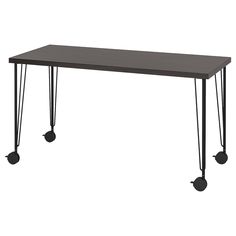 a black table with hairpinks on the legs and a white backround