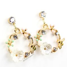 These Are A Brand New Set Of Whimsical Pastel Floral Bee Gold Tone Dangle Drop Stud Earrings. These Stunning Earrings Feature Pastel Green And Pink Enamel Petal Gold Tone Flowers, A Pearly White Acrylic Flower, Round Cut Glass Clear Rhinestones, And A Black And Yellow Enamel Bee On A Gold Tone Metal Circle Dangle On A Stud With A Round Cut Glass Rhinestone. This Is The Perfect Dainty Floral Addition To Your Wardrobe! All Orders Are Packaged With And Are Shipped Out Asap! Questions? Leave Us A Co Feminine Spring Dangle Earrings, Spring White Jewelry With Matching Earrings, Spring Feminine Dangle Jewelry, Feminine Spring Dangle Jewelry, White Jewelry With Matching Earrings For Spring, White Drop Earrings For Spring, Delicate White Crystal Earrings For Party, White Metal Jewelry For Spring, Spring Wedding Dangle Earrings