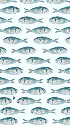 a group of fish swimming across a blue ocean watercolor painting style pattern on white paper