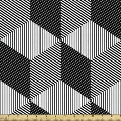 a black and white checkered fabric with an angled diagonal pattern in the center, on a ruler