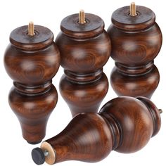 four wooden knobs with one turned on and the other turned off in different directions