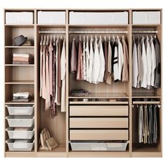 an organized closet with clothes and shoes