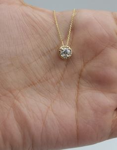 "This is a beautiful Lab Grown diamond design pendant.  It is set in real solid 14Kt Gold and the chain is 14Kt Gold as well.  You can choose if you want 14Kt White Gold, 14Kt Yellow Gold or 14Kt Rose Gold.  We have a lot of beautiful jewelry with natural diamonds. If any listing states \"diamond\" then it is a natural diamond. If the listing states \"Lab Grown\" it is a Lab Grown diamond. This is the perfect gift for mom, wife, fiancee, girlfriend, valentine, daughter, family or friend. It is a special gift for mother's day, valentine's day, wedding, anniversary, birthday, Christmas, Easter, New Year's and any holiday. Pendant Size: 7.20mm Height: 4.85mm Diamond Size: 5mm Clarity: VS-SI Color: FG Weight: 0.75 Grams Comes with 18 inch chain (If you need a longer or shorter chain contact me Yellow Gold Diamond Solitaire Necklace For Anniversary, Round Diamond Cut Yellow Gold Solitaire Necklace, Yellow Gold Solitaire Pendant Necklace For Anniversary, Anniversary Yellow Gold Solitaire Necklace Vvs Clarity, Anniversary Vvs Clarity Yellow Gold Solitaire Necklace, 14k Gold Solitaire Necklace With Diamond Pendant, Gold Diamond Cut Necklace For Anniversary, Gold Moissanite Diamond Necklace With Brilliant Cut, Gold Diamond Solitaire Necklace For Anniversary