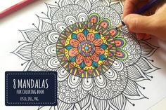 a person is drawing with colored pencils on a piece of paper that has an image of a flower