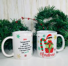 two coffee mugs with christmas themed designs on them