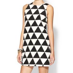 Cool Black & White Triangle Design, Retro Style, Sleeveless Lined, Flowy Material: 100% Polyester, Lining 97% Polyester, 3 %Spandex Measurements Taken Hanging And Are Approximate 35 Inches Length 20 Inches Width Chic Sleeveless Black And White Mini Dress, Chic Black And White Sleeveless Mini Dress, Casual Sleeveless Black And White Mini Dress, Casual Black And White Sleeveless Mini Dress, Chic Black And White Sleeveless Dress, Sleeveless Black And White Mini Dress For Party, Black And White Sleeveless Party Dress, Black And White A-line Summer Dress, Chic Black And White Summer Dress