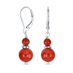 Add vibrant color effortlessly with our dyed red Coral earrings. Featuring an 8mm ball in stunning red, these sterling silver earrings have a polished finish and Lever back design for easy fastening. Perfect for adding a fun dash of red to your school or work look, or pairing with your favorite dress for sophisticated style. Get ready with our dyed red Coral earrings. Elegant Carnelian Earrings, Red Hypoallergenic Round Bead Earrings, Red Carnelian Earrings, Round Carnelian Earrings, Nickel-free Red Carnelian Earrings, Nickel-free Carnelian Jewelry, Hypoallergenic Red Round Jewelry, Carnelian Round Earrings With Ear Wire, Silver Carnelian Jewelry With Ear Wire