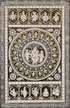 an intricately decorated book cover with gold and black designs on the front, depicting two figures