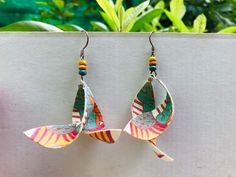 "These are 100% handcrafted earrings made by our artisans in Vietnam. The paper used is our traditional paper called \"Dó paper\", which is made in several steps from the bark of the \"Dó plant\". This paper is very strong and but extremely light, so you will feel like nothing hang on your ears! Very special feeling I promise! If you get the little rain, please dry it with a hairdryer. For big rain, maybe the best that you could save it in your pocket :) Each pair of earrings is unique and envir Handmade Artisan Wrap Earrings For Gifts, Fair Trade Dangle Earrings As Gift, Multicolor Wrap Earrings As Gift, Handmade Multicolor Wrap Earrings For Gift, Unique Fair Trade Earrings For Gift, Unique Fair Trade Earrings As Gift, Handmade White Wrap Earrings For Gift, Style Birthday, Social Enterprise