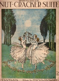 an advertisement for nut - cracker suite, with two dancers in white dresses and trees