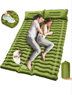 a man and woman laying on an inflatable mattress with a dog next to it