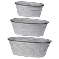 three round metal baskets sitting on top of each other