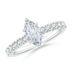 a white gold ring with an oval cut diamond and pave set shoulders