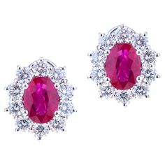 Oval Burma Red Ruby with Round Diamonds White Gold Earrings. Classic Design for this Earrings with a pair of Stunning Oval Red Ruby Faceted ct. 3.94 with Round Diamonds ct. 2.94 for this Unique Piece. Designed in Italy. Angeletti Boasts an Exceptional History Made of Pure Jewelry Tradition, a Blend of History and Modernity. Flagship store established in Piazza di Spagna / Via Condotti Area Since 1940. For the complete Angeletti collection on 1stDibs, please visit our Angeletti storefront. Ruby Diamond Earrings, Diamond Chandelier Earrings, Diamond Chandelier, Ruby Earrings, White Gold Earrings, Ruby Diamond, Red Ruby, Chandelier Earrings, Oval Cut