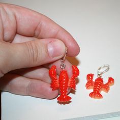 "Red Lobster Earrings They measure 1.35\" long Hooks are sterling plated, extra secure and work with gauges" Novelty Red Pierced Earrings, Red Novelty Drop Earrings, Lobster Earrings, Ocean Earrings, Mermaid Earrings, Red Lobster, Big Earrings, Seafood, Etsy Earrings