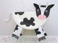 a paper plate shaped like a cow