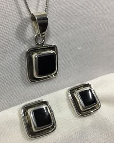 "Made in Mexico, this vintage sterling silver and onyx set of pendant on an 18\" chain and matching pierced earrings are a beautiful set. The pendant measures 3/4\" square and the earrings 5/8\" square." Vintage Pendant Necklace, Gold Rope Chains, Onyx Jewelry, Onyx Necklace, Heart Pendant Diamond, Black Pendant, Delicate Rings, Opal Pendants, Pierced Earrings