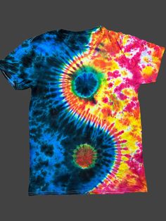 a colorful tie - dyed t - shirt with two circles on the front and back