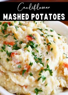 mashed potatoes in a white bowl with parsley on top and text overlay that reads cauliflower mashed potatoes