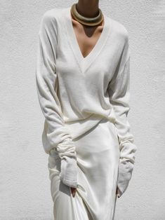 Wool blend knit in silky finish. Long oversized sleeves and deep V-neck. Ribbed neckline. Model is in MINUSEY ONE SIZE. ✔️ Free worldwide express shipping over $100✔️ Loved by 6,500+ customers✔️ Limited edition collections, maximum styleStay ahead of the trend with can’t-find-anywhere-else staples. Your closet will thank you 💕* MINUSEY ONE SIZE = EU 34-38, US 2-6* 40% Wool / 10% Cashmere / 50% Acrylic* Dry clean* Made in Korea - Model Height: 172cm/5'7" (US2, EU34) Oversized Sleeves, Waiting List, Denim Bag, Leather Dresses, Ribbed Neckline, Sweater Blouse, The Trend, Light Jacket, Leather Coat