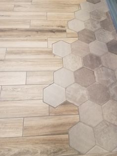 the floor is made up of different types of tiles