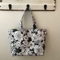 If you wish, please join me on instagram @bethsmarketbags for coupons, updates and just good ol' eye candy!    The base of this tote bag is 13 1/2" X 6"(measures about 19.5 inches across the top of the bag). The height is 11". Handles are 22" long end to end. 8x6 inch interior pocket with label reading "Beth's Market Bags." Fully lined with coordinating oilcloth . Do not be afraid to get these totes wet or dirty...they clean up great with a hot soapy sponge! Handmade by me. Beth:) PLEASE KNOW THAT COLOR CAN VARY A BIT DUE TO COMPUTER VIEWING AND DYE LOT FROM ROLL TO ROLL. BAGS ARE MADE TO ORDER SO FLOWERS AND FRUIT MAY VARY FROM THE LISTING PHOTO.  PLEASE LET ME KNOW IF YOU WANT THE EXACT FLORAL ARRANGEMENT YOU SEE IN THE LISTING PHOTO. THANK YOU! BETH Market Tote Bag, Market Bags, Do Not Be Afraid, Market Tote, Oil Cloth, Market Bag, Perfect Bag, Beautiful Bags, Join Me