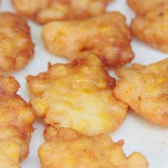 some fried food is on a white plate