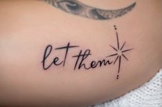 a woman with a tattoo that says let them fly