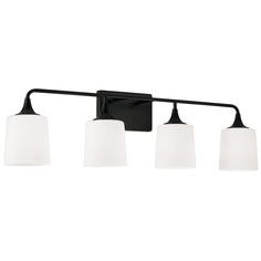 three light bathroom fixture with black finish and white glass shades on the bottom half of it