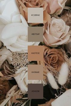 the color scheme is neutral and brown with white roses, feathers, and other flowers