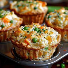 there are many different types of pies on the tray, including one with peas and carrots