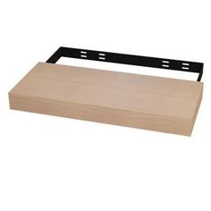 a wooden shelf with two black brackets on the top and one is empty, in front of white background