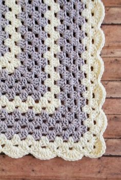 a crocheted dishcloth on a wooden surface